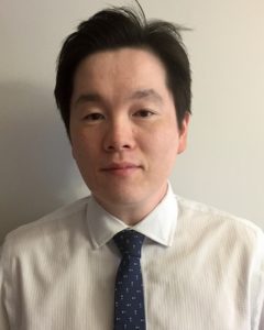 man smiling tie shirt