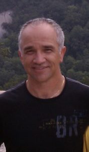 man smiling gray hair