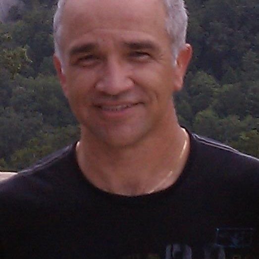 man smiling gray hair