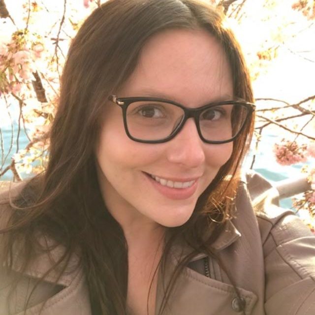 woman smiling glasses profile photo