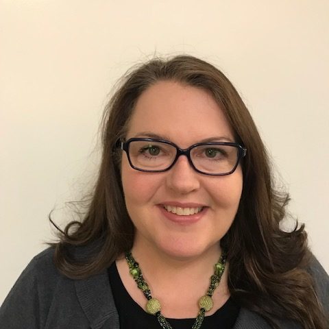 woman smiling glasses profile photo